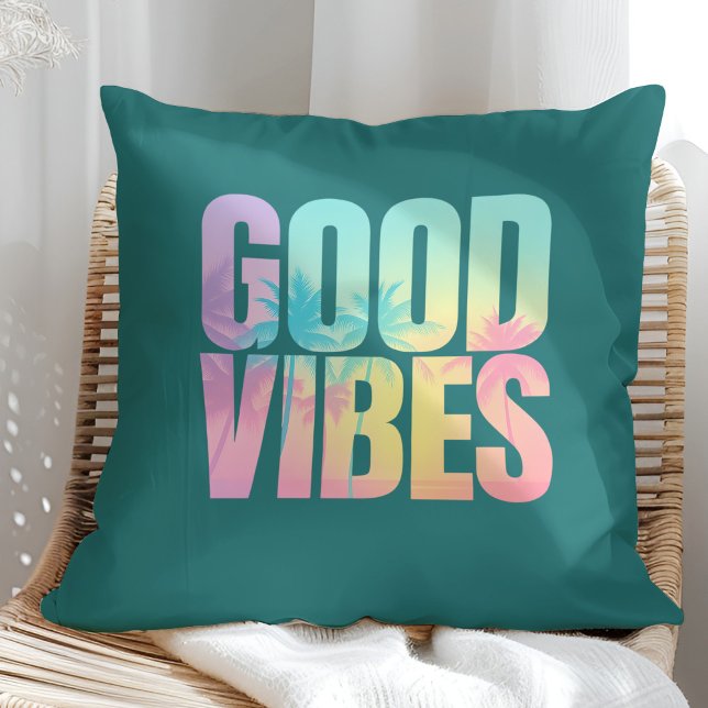 "Good Vibes" Vibrant Tropical Quote Cushion ("Good Vibes" Vibrant Tropical Quote Throw Pillow on a boho sunny rattan chair.)