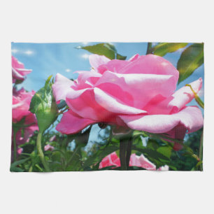 Gorgeous pink rose in blue sky. Floral photography Tea Towel