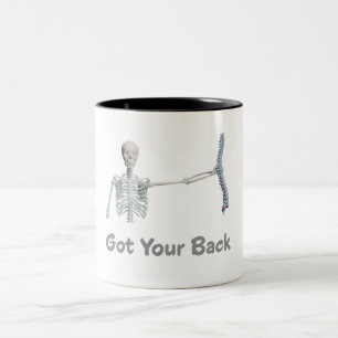Got Your Back Skeleton Holding Spine Two-Tone Coffee Mug