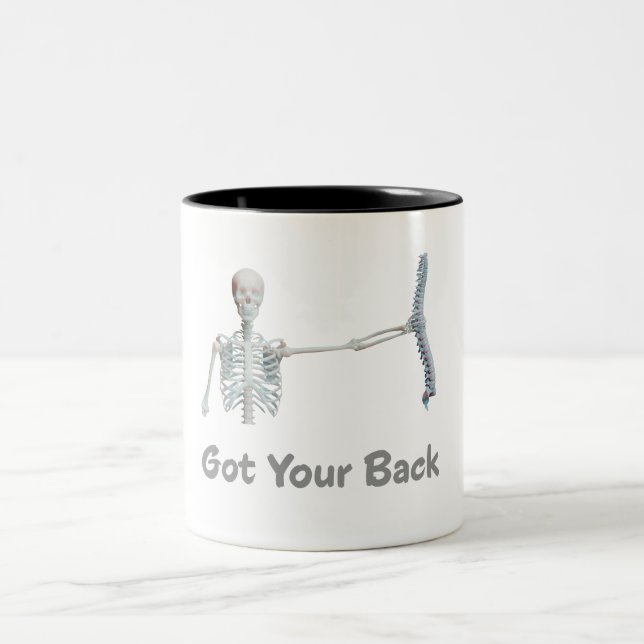Got Your Back Skeleton Holding Spine Two-Tone Coffee Mug (Center)