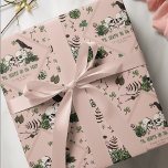 Goth St. Patricks Day Floral Skulls Irish Wedding Wrapping Paper<br><div class="desc">This unique and elegant Irish gothic wedding wrapping paper design features beautiful hand-drawn Irish-themed illustrations in black ink against an elegant blush pink background. Featuring green clovers, skulls, crows, green roses and wildflowers, this festive green wrapping paper is ideal for Irish weddings, bridal showers, and other March celebrations. Personalise with...</div>