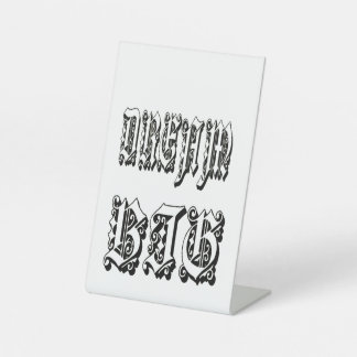gothic blackletter typography pedestal sign