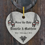 Gothic Silver Skulls Wedding Save the Date Ceramic Ornament<br><div class="desc">A dark, gothic save the date ornament, which has pairs of little silver skulls with red eyes hanging down from the top and a gothic black jewel at the bottom. All details can be customised as needed in the Personalise this Template link above. This deliciously creepy wedding keepsake is part...</div>