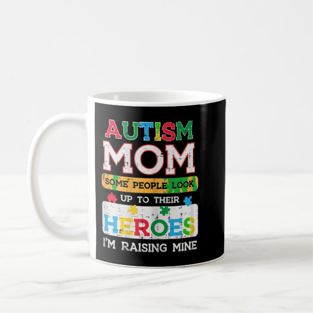 Grab this cute Autism Mum Heroes Raising Mine T-Sh Coffee Mug (Left)
