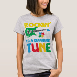 Grab this cute Rockin To Different Tune Guitar T-S T-Shirt