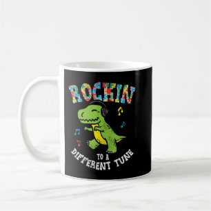 Grab this cute Rockin To Different Tune T-Rex Danc Coffee Mug