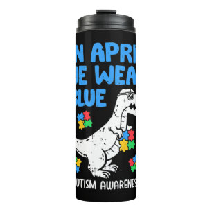 Grab this funny In April We Wear Blue Dinosaur Hol Thermal Tumbler