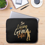 Grace Life Inspiration Quote with Male Silhouette Laptop Sleeve<br><div class="desc">Embrace your personal style and faith with this stylish laptop sleeve featuring the inspirational quote typography: "I'm Living the Grace Life." The sleeve showcases a captivating graphic illustration of a male silhouette, adding an extra touch of visual appeal. Whether you're heading to work, school, or a coffee shop, this laptop...</div>