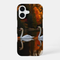 Graceful White Swans Gliding Across Autumn Pond