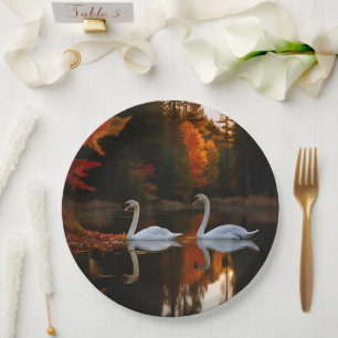 Graceful White Swans Gliding Across Autumn Pond Paper Plate