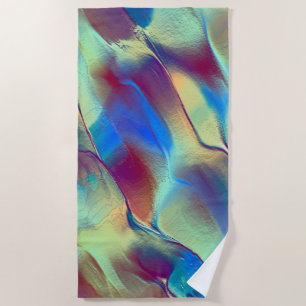 Gradient coloured rocky dune with soft bright beach towel