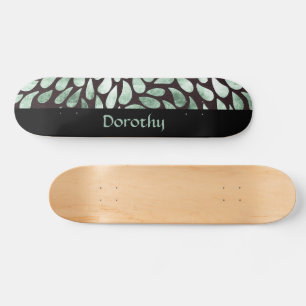 Gradient green petals on black skateboard