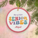 Graduate Senior Vibes Class of 2025 Christmas Ceramic Ornament<br><div class="desc">A perfect gift for the senior set to graduate soon. The design features multi-coloured retro text reading "Senior Vibes". Personalise with holiday ornament with the grad's name.</div>