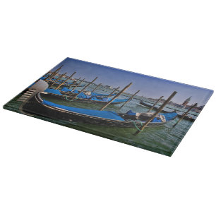 Grand Canal water with gondalo boats lined up Cutting Board
