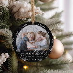 Grandkids Make Life Grand Photo Ceramic Ornament<br><div class="desc">Create a sweet gift for a beloved grandma or grandpa with this beautiful ceramic photo ornament. "Grandkids make life grand" appears along the bottom with white snowflake accents. Personalise with the year beneath,  and the grandchildren's names curving across the top. Add a second photo to the back.</div>
