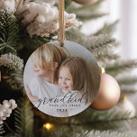Grandkids Make Life Grand | Photo Ceramic Ornament<br><div class="desc">Create a sweet gift for a beloved grandma or grandpa with this beautiful ceramic photo ornament. "Grandkids make life grand" appears as an overlay on your favorite photo in calligraphy lettering. Customize with the year and add a second photo to the back.</div>