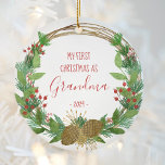 Grandma First Christmas Rustic Wreath Baby Photo Ceramic Ornament<br><div class="desc">This design features a rustic watercolor Christmas wreath decorated with pine cones, berries and candy canes, surrounding the words "My First Christmas as Grandma" and the year in whimsical red printing and handwriting fonts. Customise the reverse side with a favourite photo of the new grandchild, encircled by the same wreath....</div>