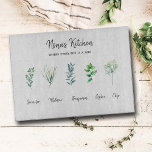 Grandma Gift Aromatic Herbs Grandchildren Names Cutting Board<br><div class="desc">Elevate Grandma's kitchen - and melt her heart - with our personalised glass cutting board. Featuring a beautiful design of of five aromatic plants painted in watercolor, with the heartwarming message, 'Nona (Grandma, Nana etc.)'s Kitchen: Where Every Bite is a Hug'. Template for the names of the grandchildren. A perfect...</div>