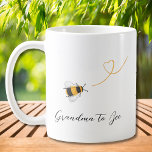 Grandma To Bee Coffee Mug<br><div class="desc">This coffee mug is decorated with watercolor honey bees and "Grandma to Bee" in stylish script typography.
Easily customisable with your monogram. Makes a lovely gift for the expectant mother.
Original Watercolor © Michele Davies.</div>