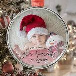 Grandparents First Christmas Photo Black Script Metal Ornament<br><div class="desc">Help them celebrate their first grandchild with this beautiful modern keepsake ornament. The off-black text reads "Our first Christmas as grandparents, " with the word "grandparents" in elegant handwriting script with flourishes before and after. Easily replace the sample image with your favourite photo of the new baby, and add his...</div>