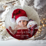 Grandparents First Christmas Photo White Script Ornament<br><div class="desc">Help them celebrate their first grandchild with this beautiful modern keepsake ornament. The white text reads "Our first Christmas as grandparents, " with the word "grandparents" in elegant handwriting script with flourishes before and after. Easily replace the sample image with your favourite photo of the new baby, and add his...</div>