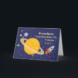 Grandson Birthday Planets in Outer Space, Rocket Card<br><div class="desc">Wish your grandson a happy birthday that is out of this world! Saturn is seen in the golden yellow colour with stars and other planets surrounding it. A rocket ship has just blasted off to wish happy birthday.</div>
