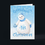 Grandson's First Christmas Snowman Greeting Card<br><div class="desc">A flurry of snowflakes surround this smiling snowman all decked out in fuzzy blue hat and mittens. A delightful Christmas design for your grandson's first Christmas greeting card. Personalise the inside verse using the template provided. I specialise in custom-made designs, contact me if you would like a unique 1st Christmas...</div>
