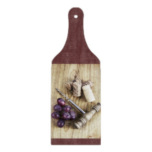 Grapes, corks and bottle opener cutting board