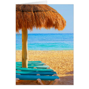 Grass Hut & Loungers On Beach