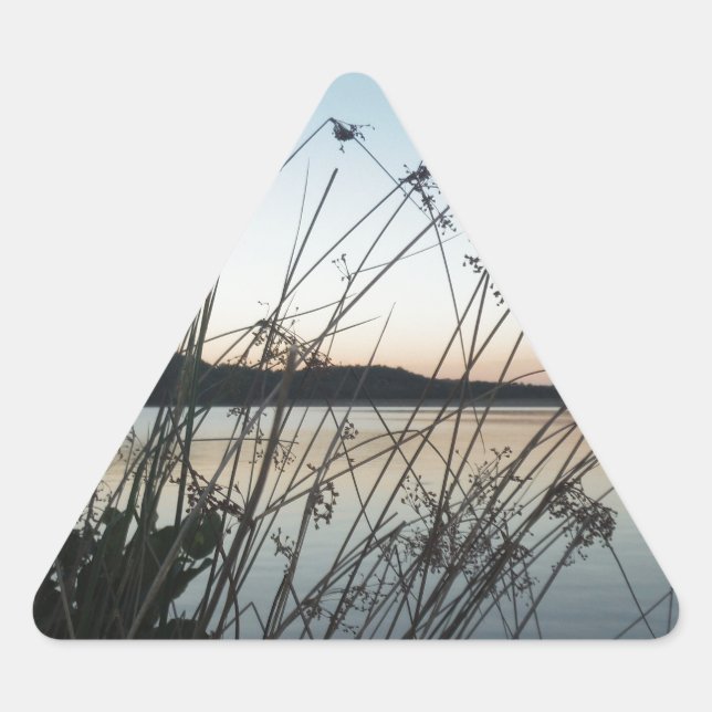 Grasses at lake Sunset Triangle Sticker (Front)