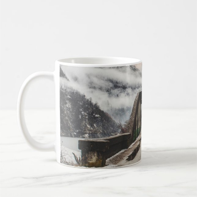 GRAY CONCRETE ARCH BRIDE BESIDE LEAFLESS TREE NEAR COFFEE MUG (Left)
