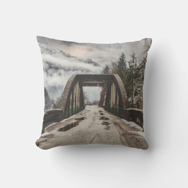 GRAY CONCRETE ARCH BRIDE BESIDE LEAFLESS TREE NEAR CUSHION (Front)