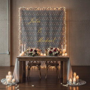 Gray wall hanging with pink heart patterns and tapestry