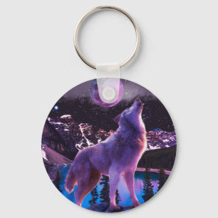 Gray wolf howling in forest key ring