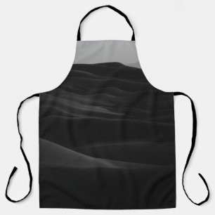 GRAYSCALE PHOTO OF DESERT APRON
