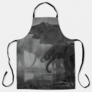 GRAYSCALE PHOTO OF ELEPHANTS DRINKING WATER APRON