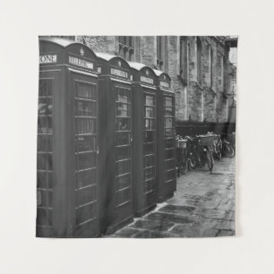 GRAYSCALE PHOTO OF FOUR TELEPHONE BOOTHS LINED UP TAPESTRY