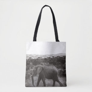 GRAYSCALE PHOTO OF GRAY ELEPHANT NEAR TREES TOTE BAG