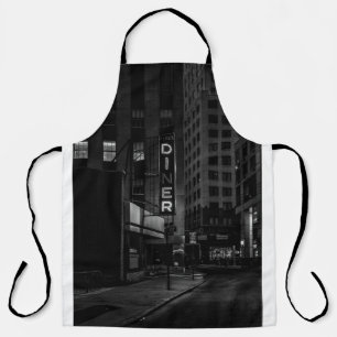 GRAYSCALE PHOTO OF PEARL DINER SIGN IN CITY APRON