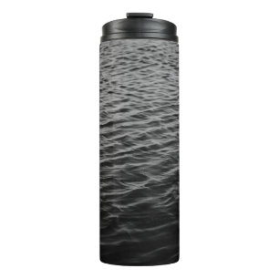 Grayscale photo of sea thermal tumbler