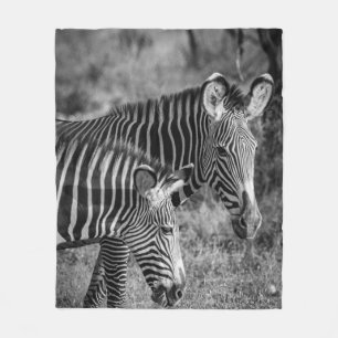 GRAYSCALE PHOTO OF ZEBRAS FLEECE BLANKET