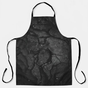 Grayscale photography of rock formation apron
