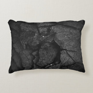 Grayscale photography of rock formation decorative cushion