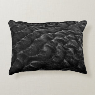 Grayscale photography of sand decorative cushion
