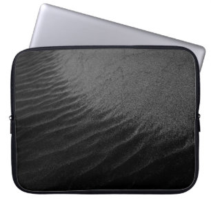 Grayscale photography of sand laptop sleeve