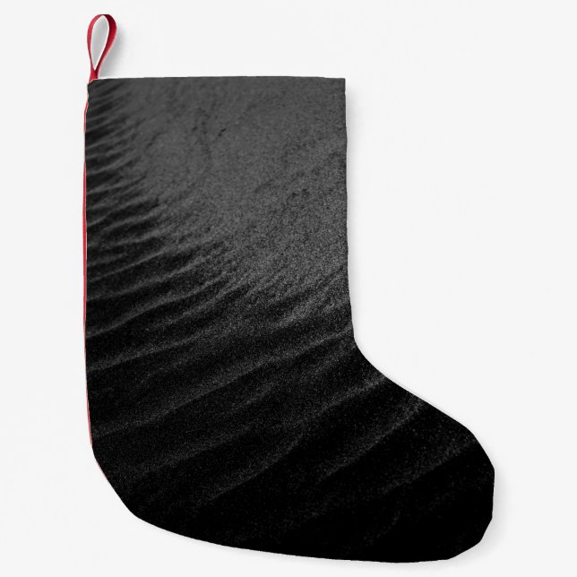 Grayscale photography of sand small christmas stocking (Front)