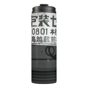 GRAYSCALE PHOTOGRAPHY OF STORE SIGN THERMAL TUMBLER