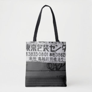 GRAYSCALE PHOTOGRAPHY OF STORE SIGN TOTE BAG