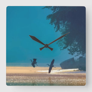 Great Blue Herons Take Flight -Teal Square Wall Clock