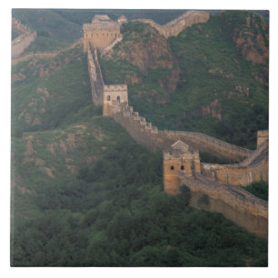 Great Wall winding through mountains. Tile